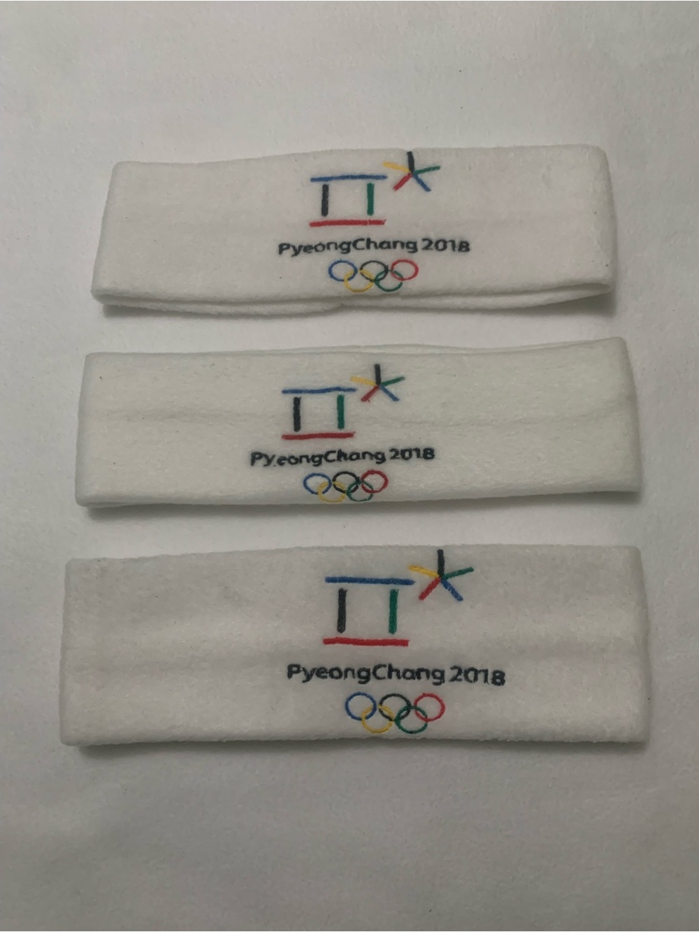 White Headband  With Embroidered Winter Olympic Logo 2018